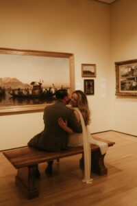 Couple posing inside the Speed Art Museum in Louisville, Kentucky.